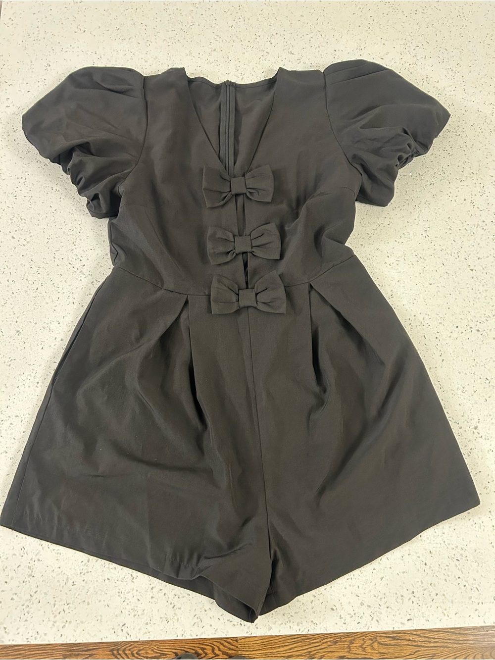 Black Puff Sleeve Romper with Front Bow Accents